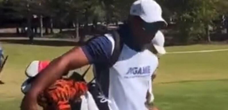 Tiger Woods shows great progress as he caddies for son Charlie