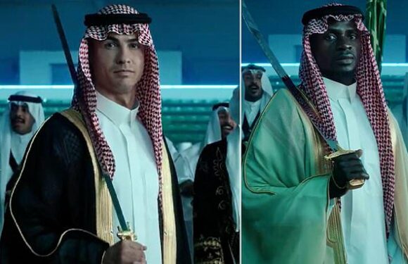 Cristiano Ronaldo dons a SWORD and traditional Saudi dress in video