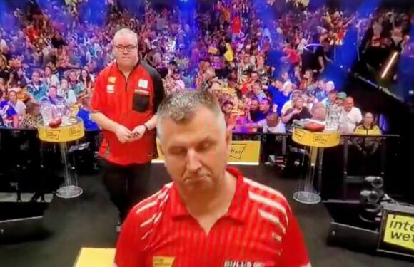 Darts star hits nine-darter during warm-up and gives coolest reaction possible