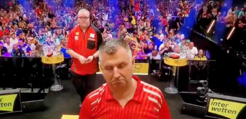 Darts star hits nine-darter during warm-up and gives coolest reaction possible