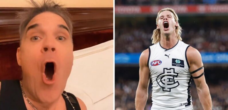 From Lygon Street to Robbie Williams’ bed, ecstatic Carlton fans celebrate