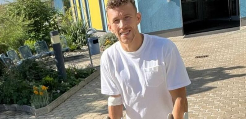 Ivan Perisic pictured on crutches after undergoing ACL surgery