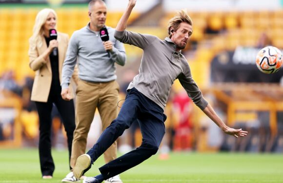 Peter Crouch HILARIOUSLY slips over in live TV crossbar challenge!