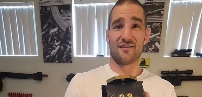 Sean Strickland shows off broken UFC belt – but fans can’t stop staring at walls
