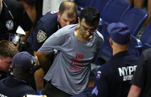 US Open semi-final interrupted by protester that glued feet to floor