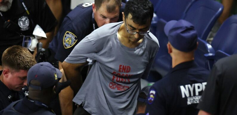 US Open semi-final interrupted by protester that glued feet to floor