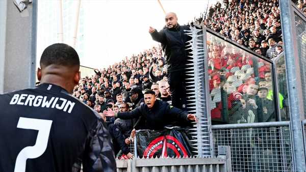 Ajax game suspended in 89th minute after a CUP is thrown on the pitch