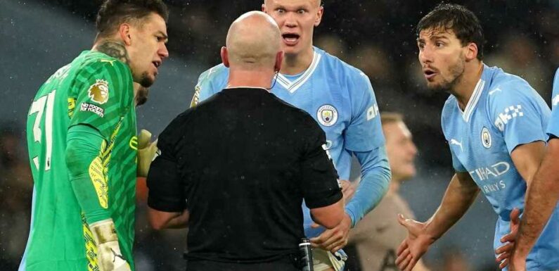 Manchester City charged by FA after players surround referee against Spurs